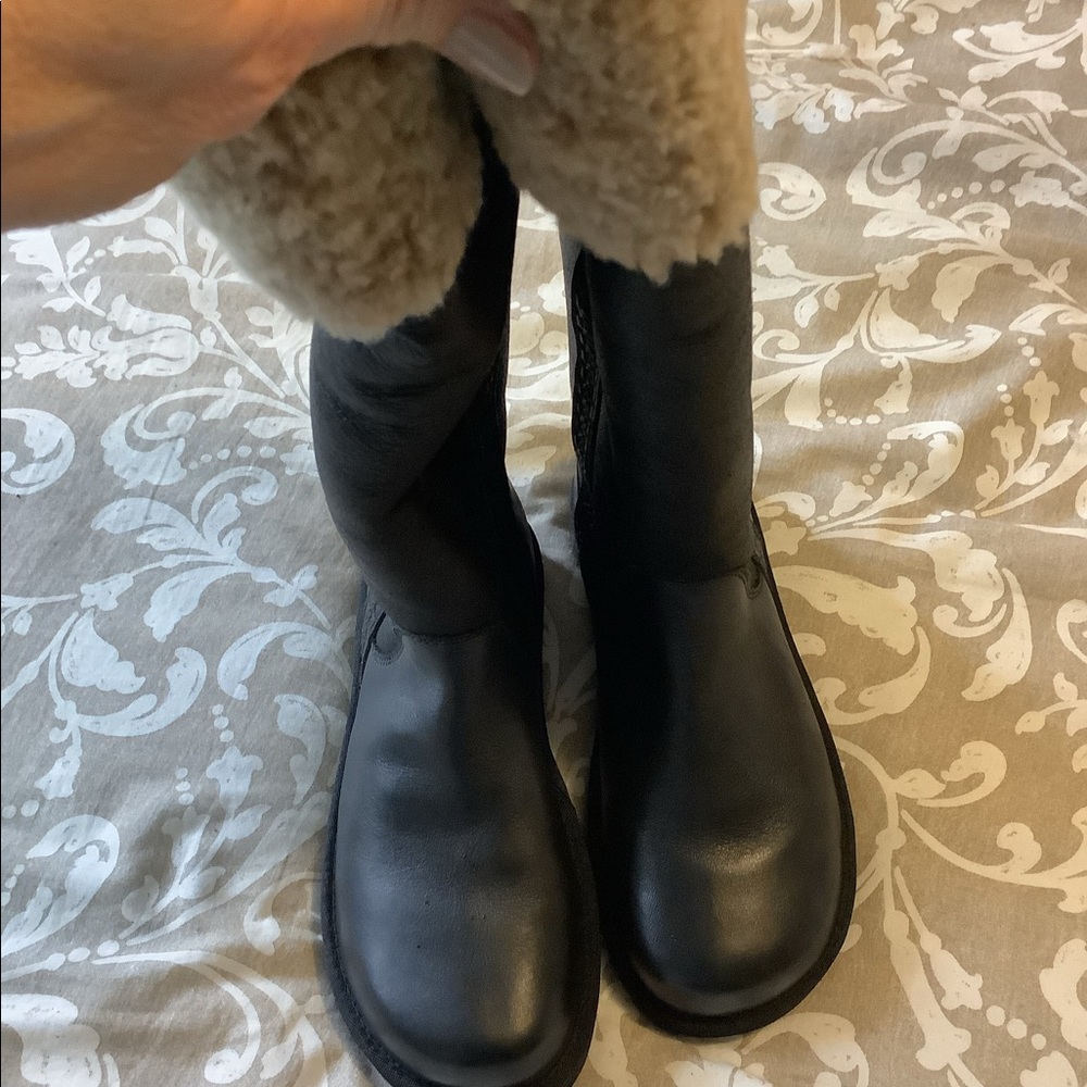 Black UGG winter leather and sheepskin boots